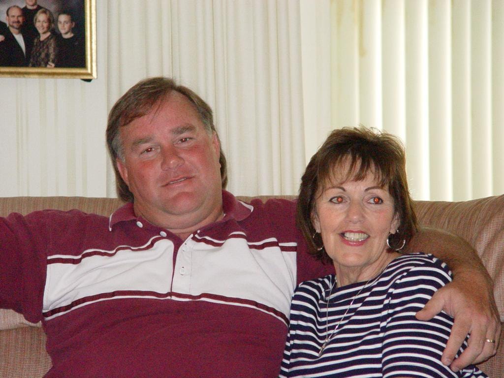 Judi A. Zettel and David Zettel Jr. together on the sofa