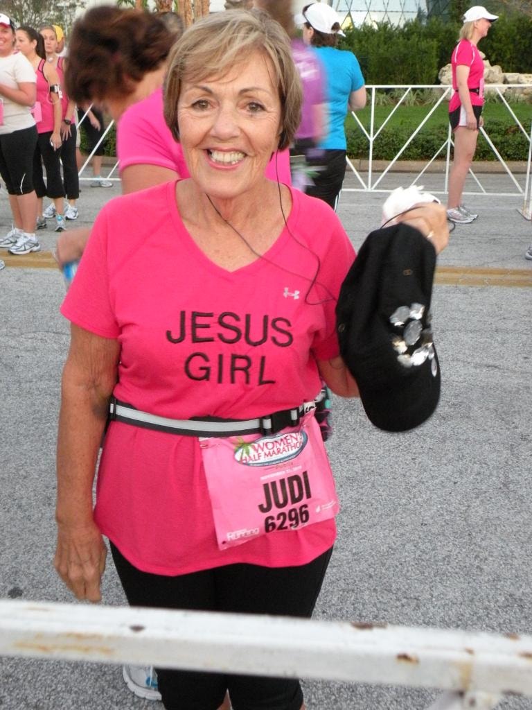 Judi A. Zettel at the Women's Half Marathon wearing a Jesus Girl shirt