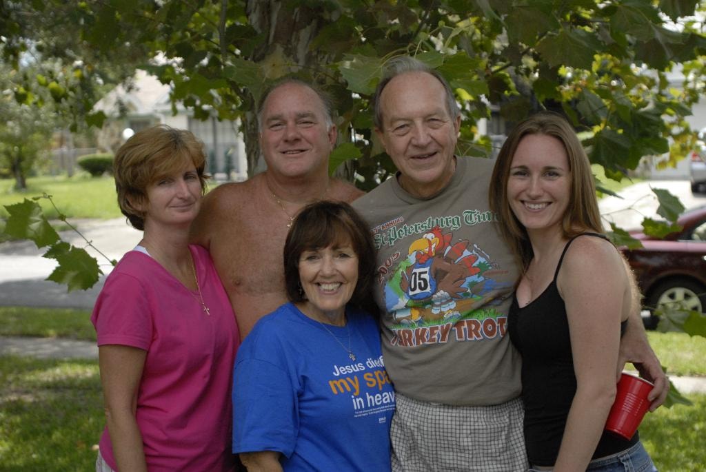 Zettel family gathered by the front tree