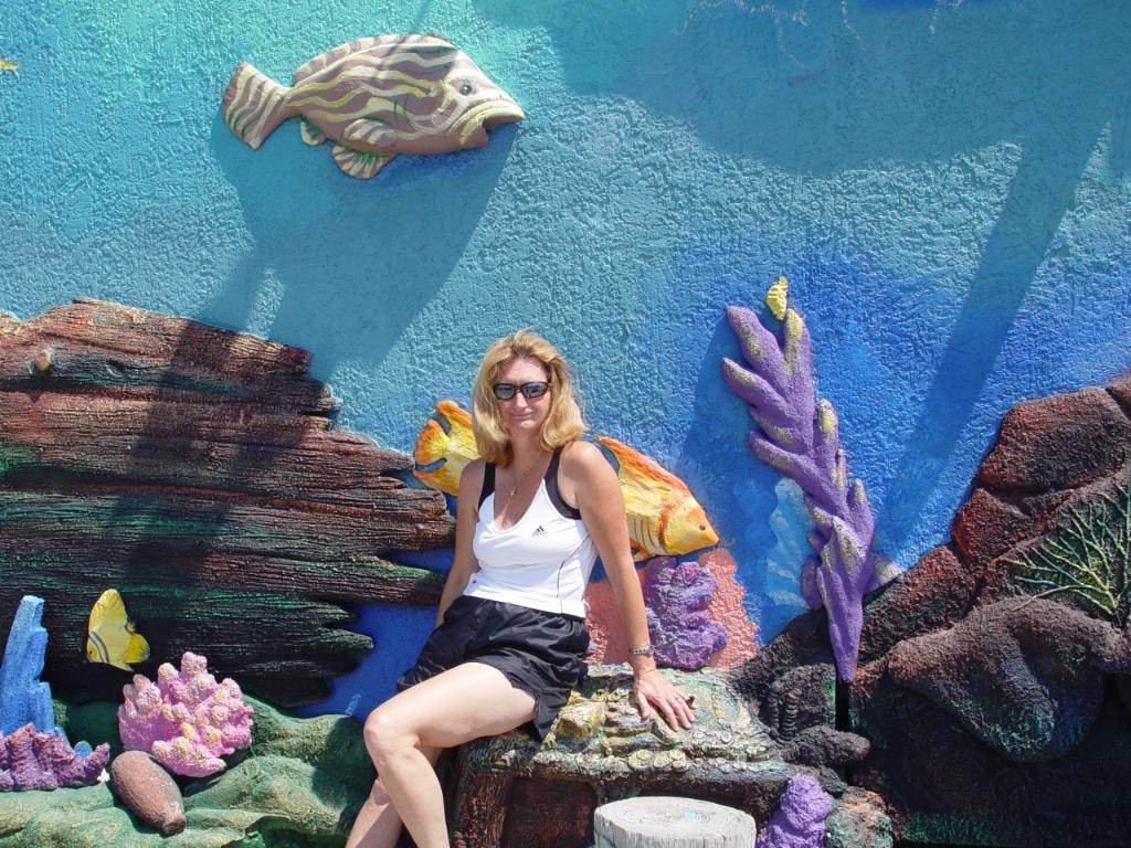 Woman at underwater mural installation