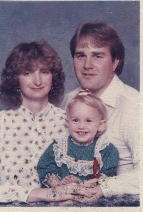 Family portrait couple with young child