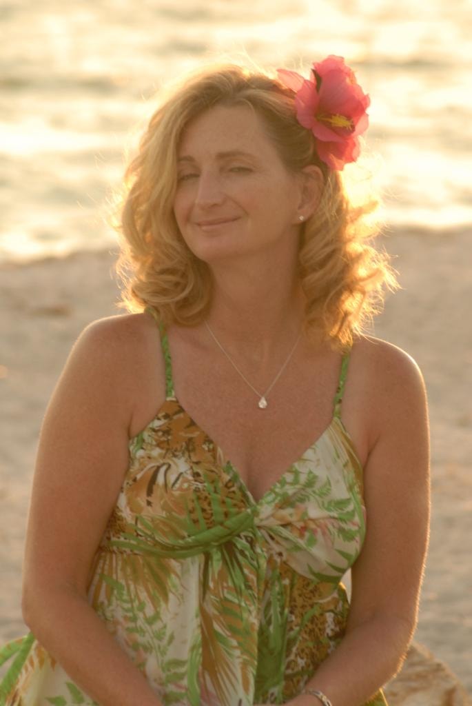 Woman at beach golden hour