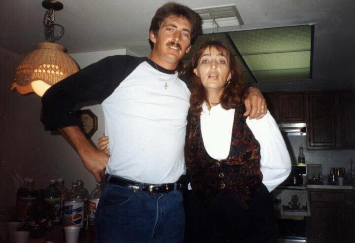 Man and woman in kitchen vintage photo