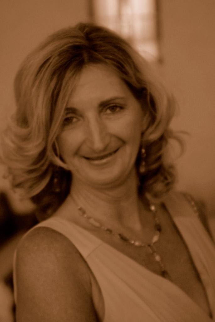 Sepia portrait of woman smiling