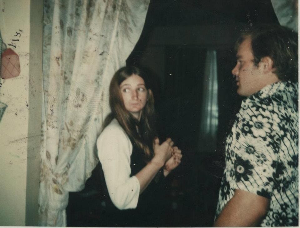 Young woman and man vintage photo indoors
