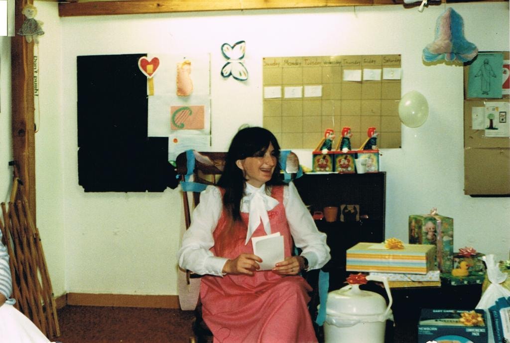Woman at baby shower in classroom