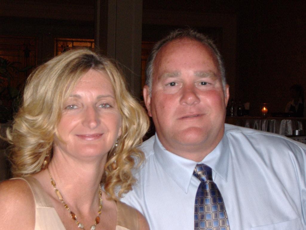 Couple dressed up at formal dinner event