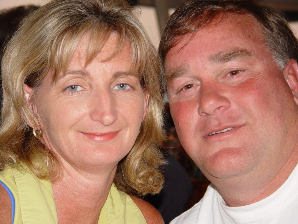 Couple close-up portrait smiling together